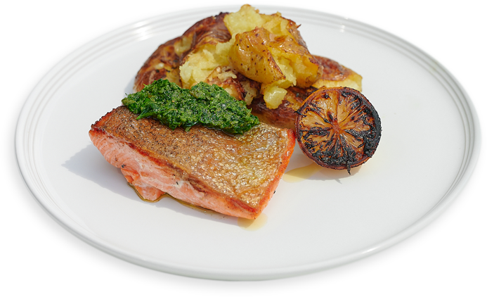 Crispy Skin Salmon with Smashed Potatoes, Charred Citrus, and Salsa Verde